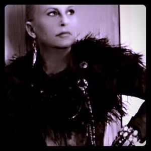 Black jeweled and feathered shoulder cover